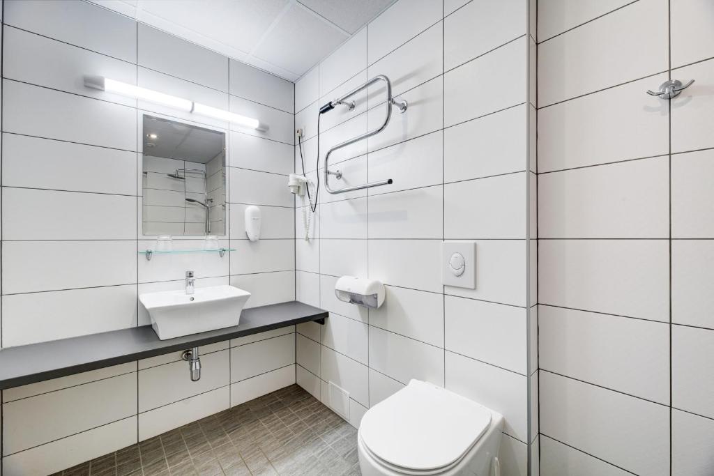 Koupelna v ubytování ESTONIA Medical Spa & Hotel