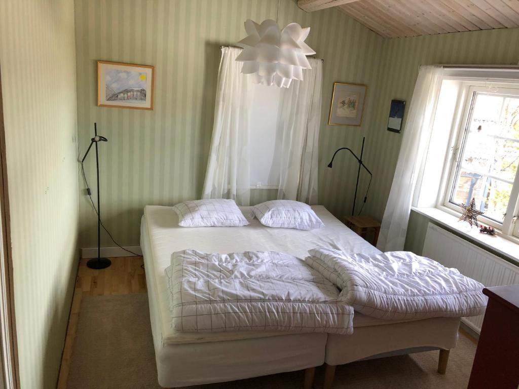 Postel nebo postele na pokoji v ubytování Stuga , Funäsdalen