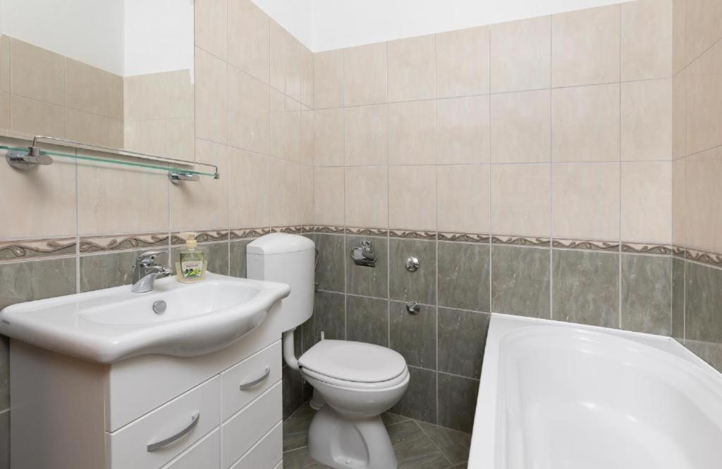 Kúpeľňa v ubytovaní Apartmani Vela