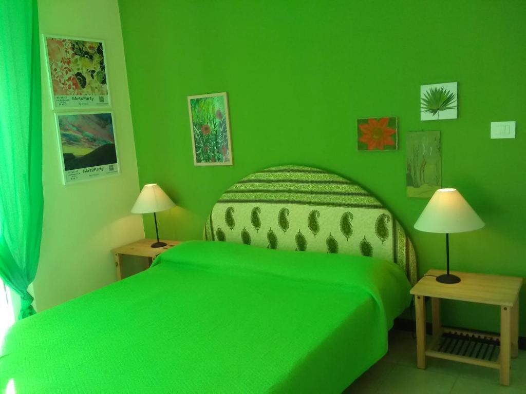 Кровать или кровати в номере LUDOVICA trilocale centrale con posto auto