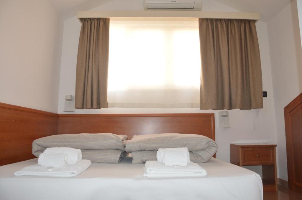 Letto o letti in una camera di Isolabella