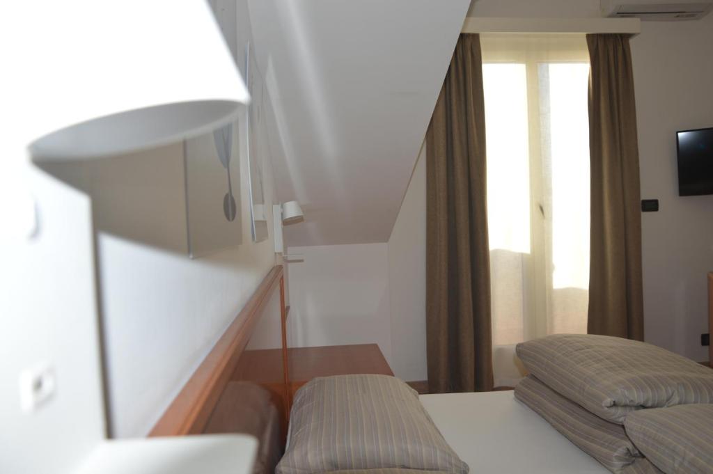 Letto o letti in una camera di Isolabella