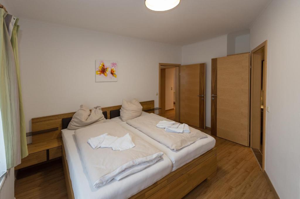 Postel nebo postele na pokoji v ubytování Gästehaus Ingeborg