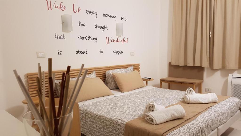 Postel nebo postele na pokoji v ubytování Rucoli