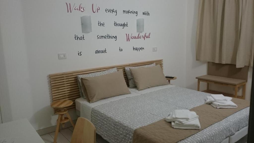 Postel nebo postele na pokoji v ubytování Rucoli