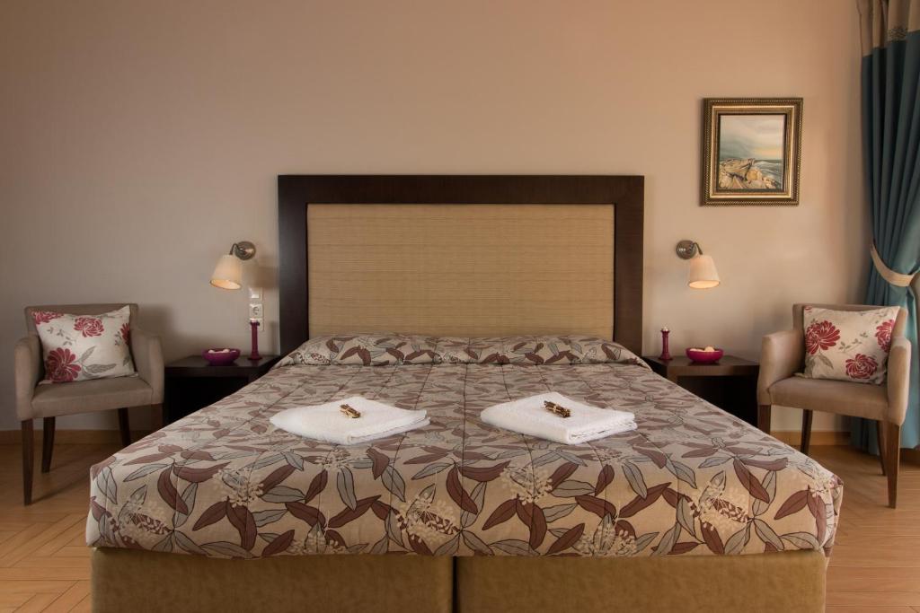Postel nebo postele na pokoji v ubytování Thalassa Hotel