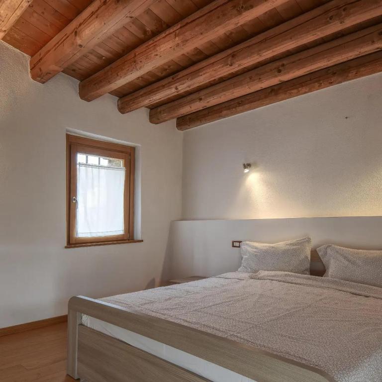 A bed or beds in a room at Romantic Boutique Hospitality