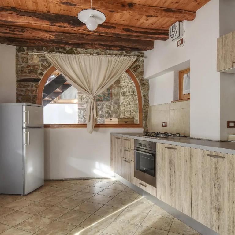 A kitchen or kitchenette at Romantic Boutique Hospitality