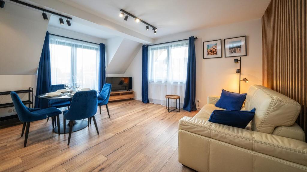 Posedenie v ubytovaní Apartamenty Sun & Snow Resorts C Białka Tatrzańska z sauną