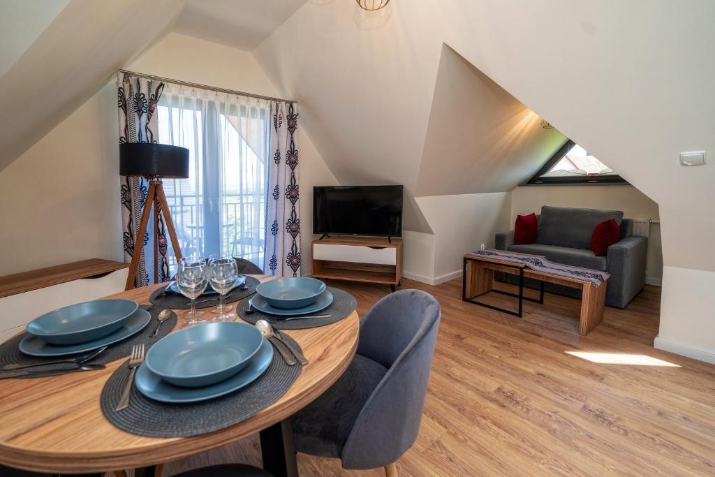 Posedenie v ubytovaní Apartamenty Sun & Snow Resorts C Białka Tatrzańska z sauną