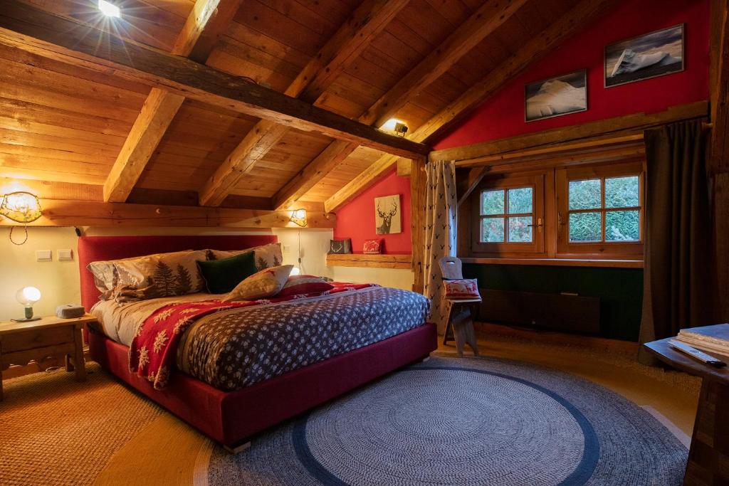 Postel nebo postele na pokoji v ubytování Magic Megève Bois