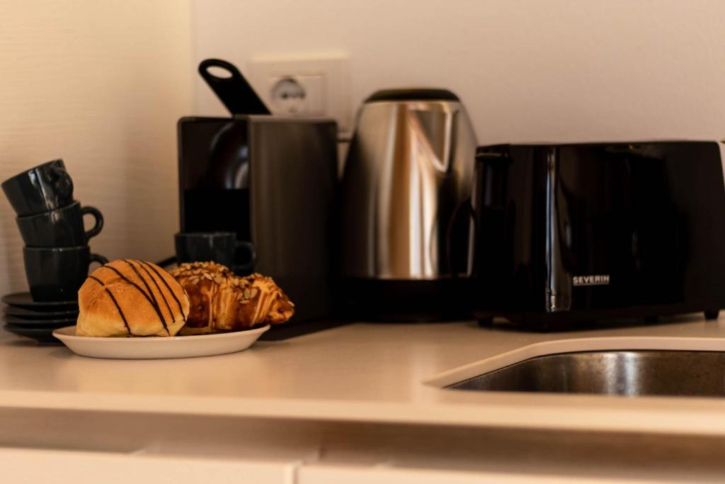 Příslušenství pro přípravu čaje a kávy v ubytování Casa Flora
