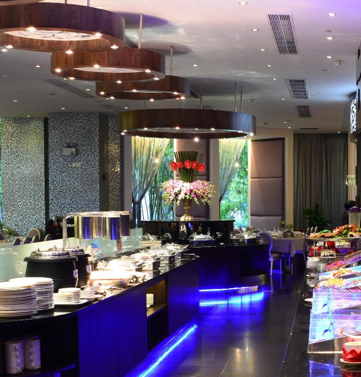 Restaurace v ubytování Ramada by Wyndham Pearl Guangzhou-Canton Fair Free Shuttle Bus