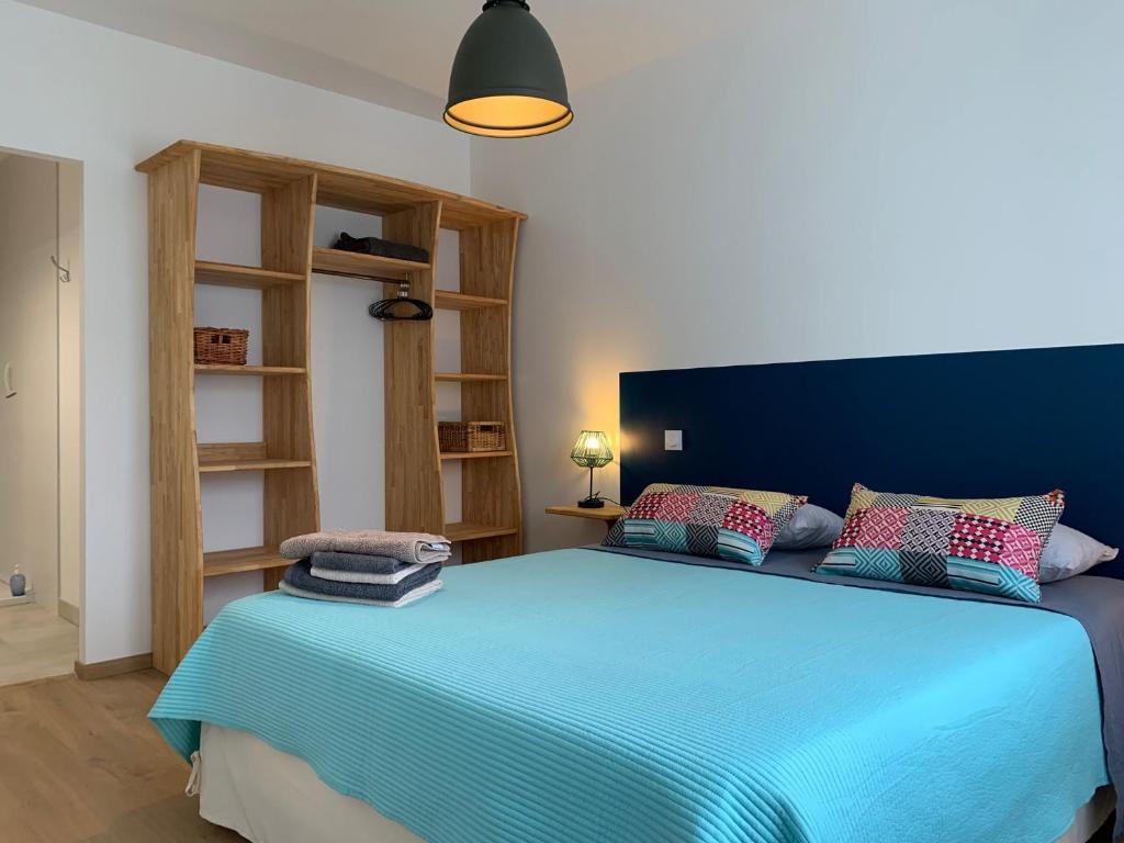 Postel nebo postele na pokoji v ubytování Chambre d'hotes CHEVREFEUILLE