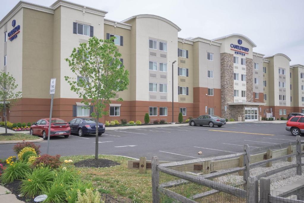 a parking lot in front of a hotel at Candlewood Suites Philadelphia - Airport Area, an IHG Hotel in Chester