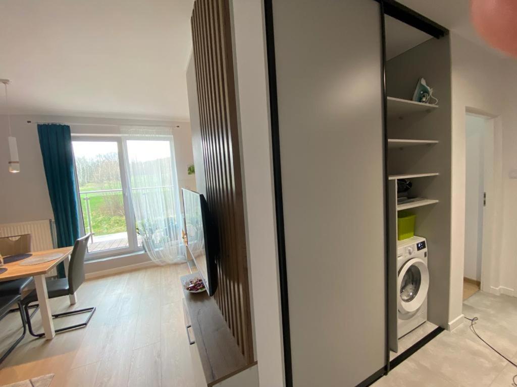 Kuchyň nebo kuchyňský kout v ubytování Apartament Zielone Wzgórze