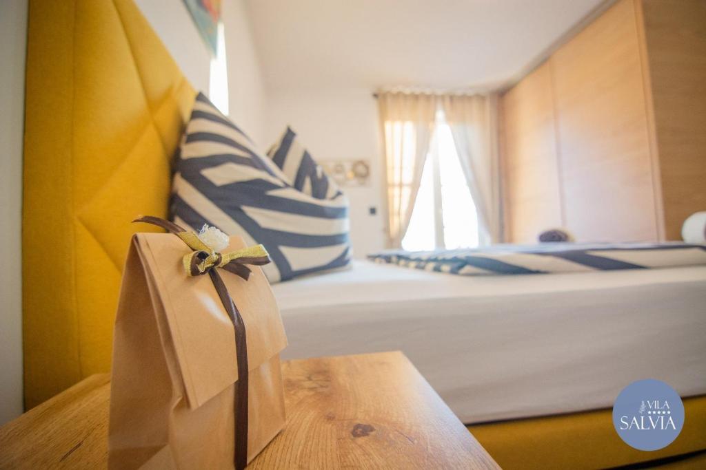 Postel nebo postele na pokoji v ubytování Rooms Salvia