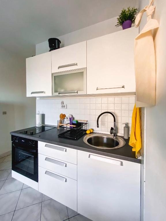 Kuhinja ili čajna kuhinja u objektu Sali Modern Seaview Apartment