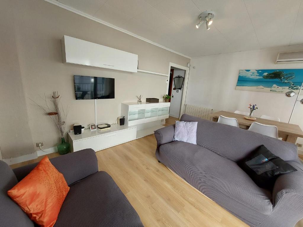 TV a/nebo společenská místnost v ubytování Calafell Beach.Primera línea.Céntrico.