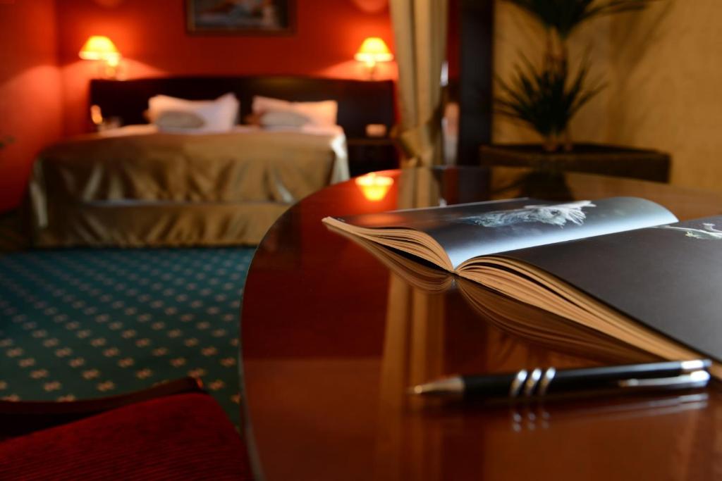 Postel nebo postele na pokoji v ubytování Hotel Europa