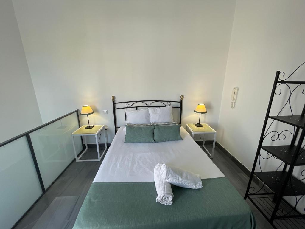 Posteľ alebo postele v izbe v ubytovaní DreamsApt Curtidores 6 Suites AT