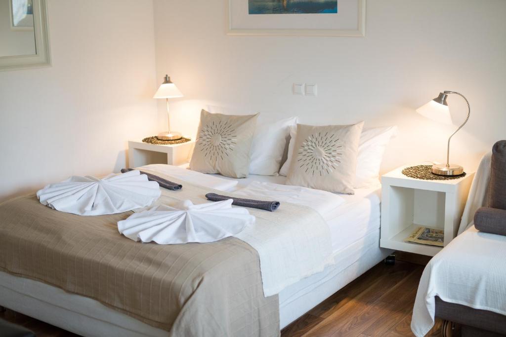 Postel nebo postele na pokoji v ubytování Bled Apartments