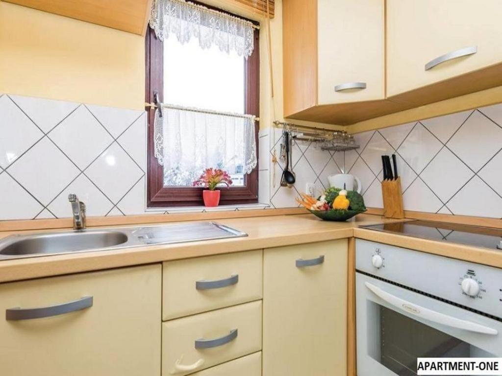 Kuchyňa alebo kuchynka v ubytovaní Apartment Monte Rosa