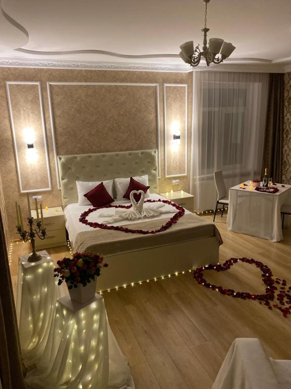 Postel nebo postele na pokoji v ubytování Hotel Sharl