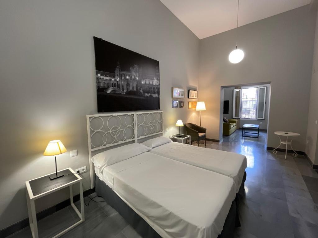 Posteľ alebo postele v izbe v ubytovaní DreamsApt Curtidores 6 Suites AT