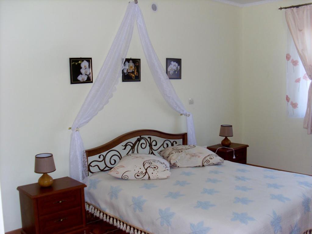 Postel nebo postele na pokoji v ubytování Villa Eden DeLux