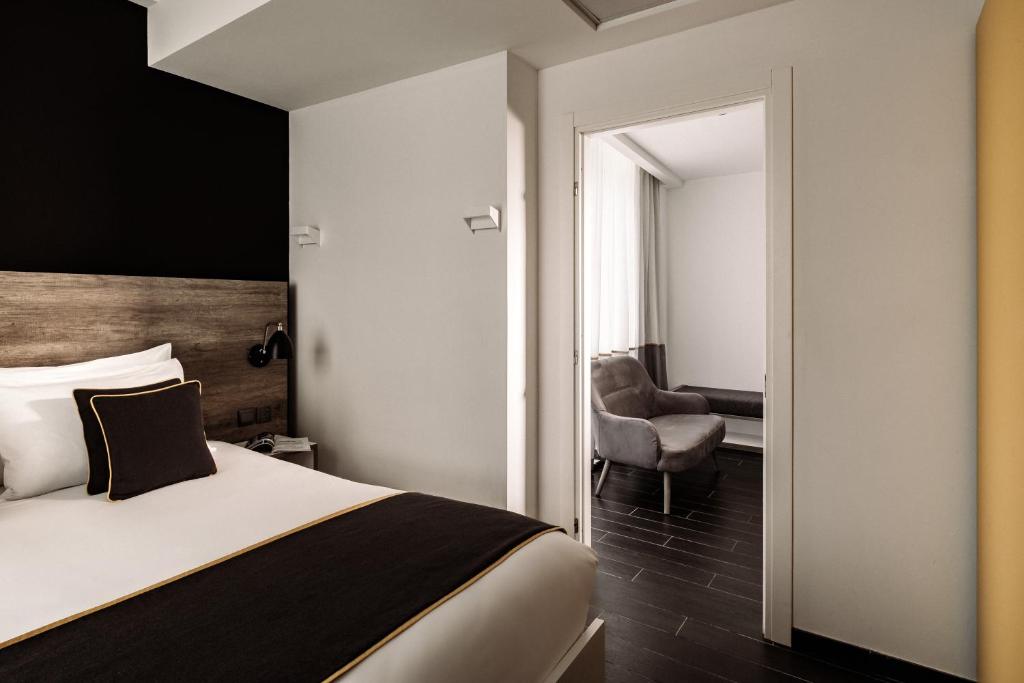 Vuode tai vuoteita majoituspaikassa be.HOTEL