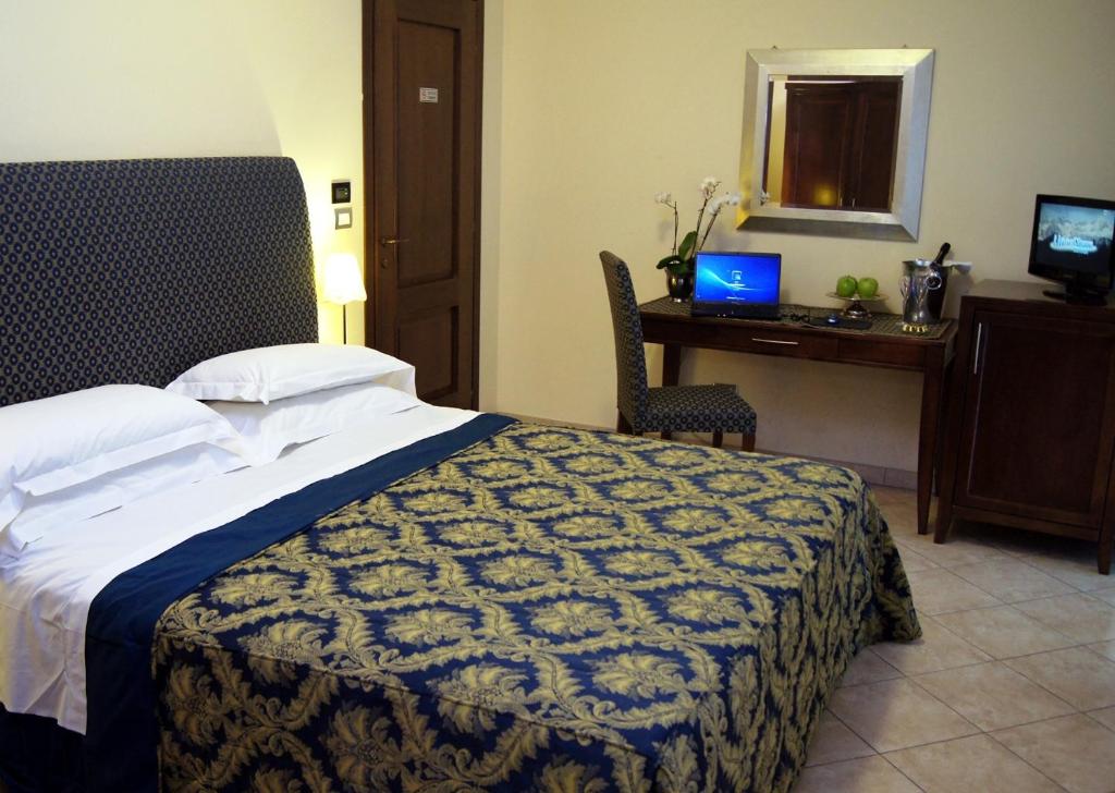 Postel nebo postele na pokoji v ubytování Hotel e trattoria San Giorgio