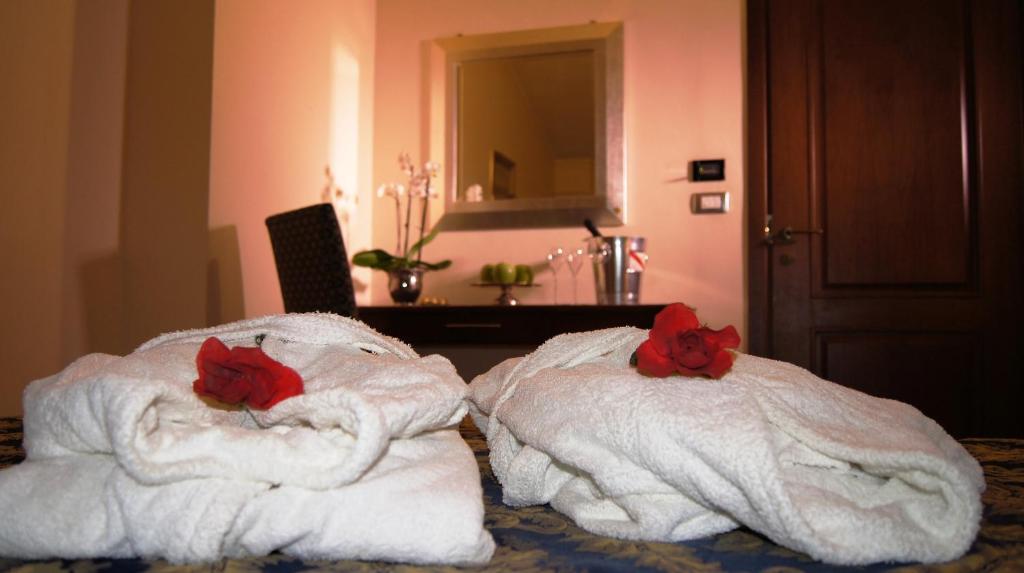 Postel nebo postele na pokoji v ubytování Hotel e trattoria San Giorgio