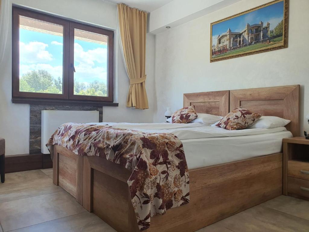 Postel nebo postele na pokoji v ubytování Bački dvor
