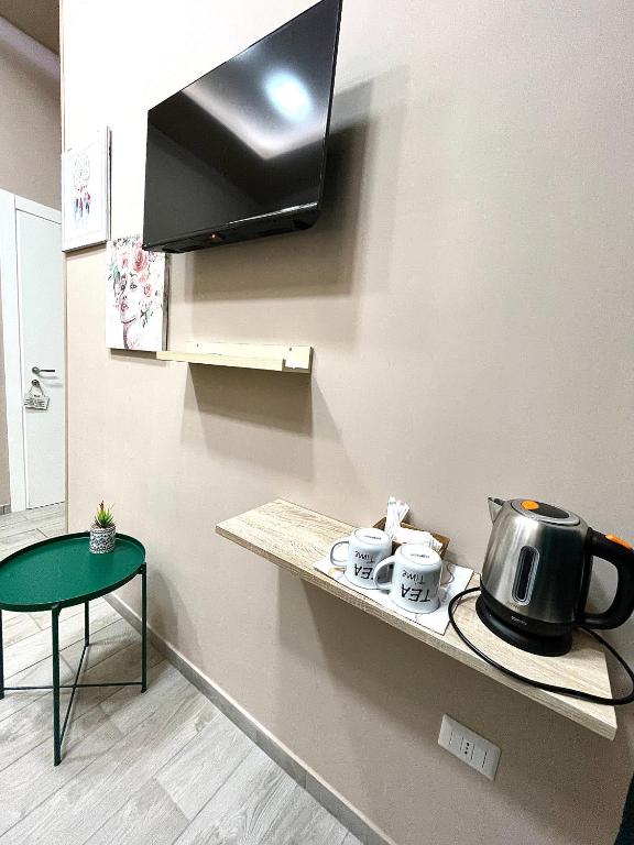 Televízia a/alebo spoločenská miestnosť v ubytovaní Valentine’s house