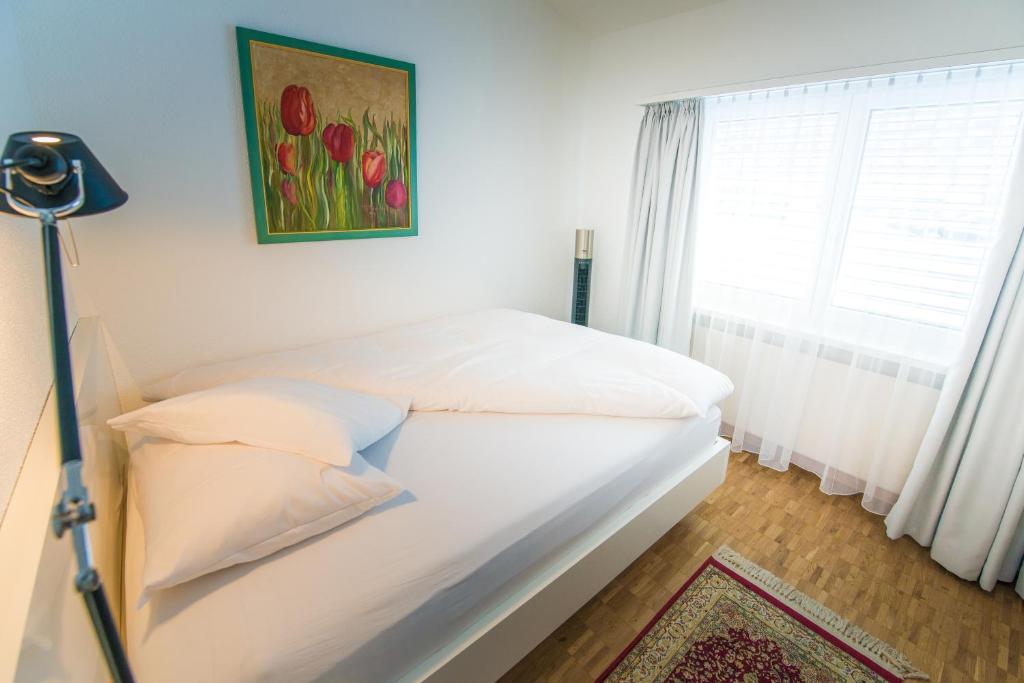 Postel nebo postele na pokoji v ubytování Hotel Hohberg "Next to BBC Arena"