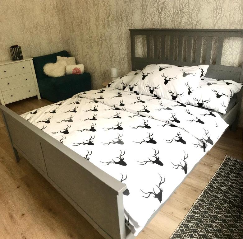 Postel nebo postele na pokoji v ubytování Apartmány Trio Horní Maršov