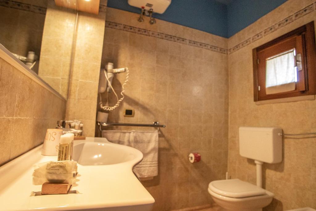 Łazienka w obiekcie Relais Isole del Sud