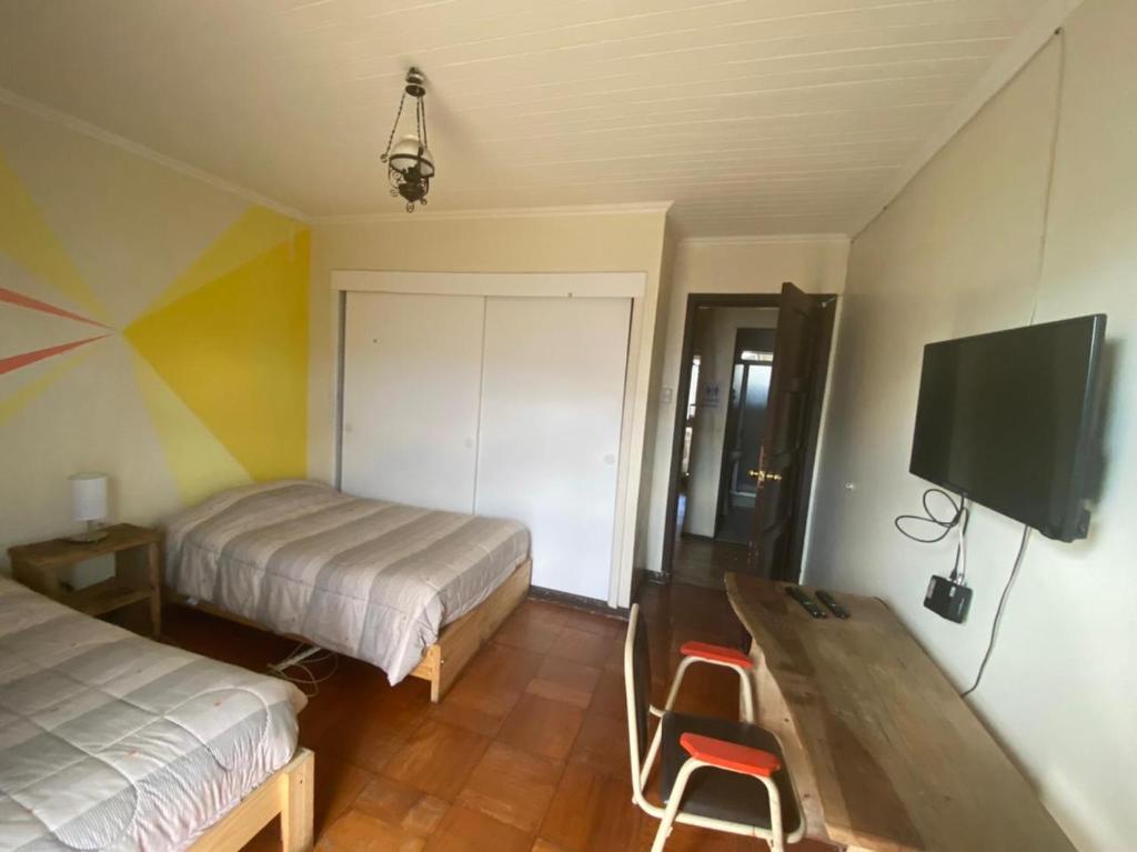 TV a/nebo společenská místnost v ubytování Hostel Cartel 405