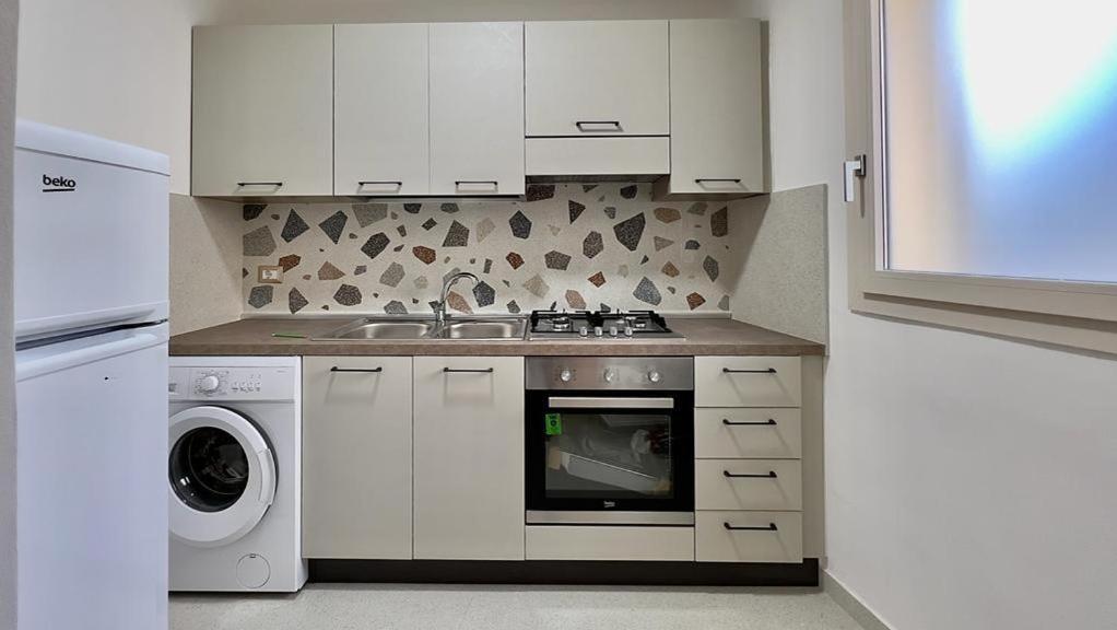 Kuchyň nebo kuchyňský kout v ubytování Vico Sauro Apartament