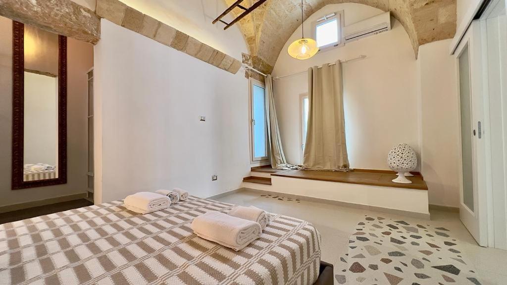 Postel nebo postele na pokoji v ubytování Vico Sauro Apartament