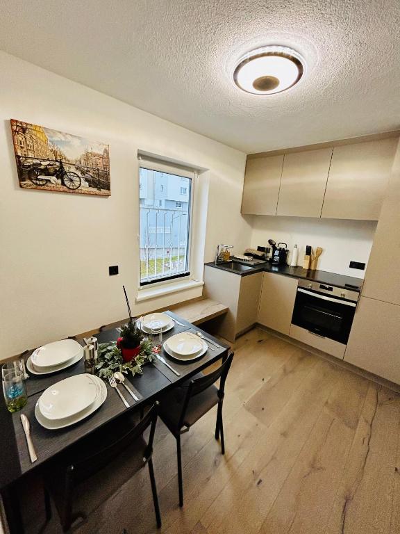 Kuchyňa alebo kuchynka v ubytovaní Idyllische Suite in Zentrumsnähe mit Parkplatz Top 1