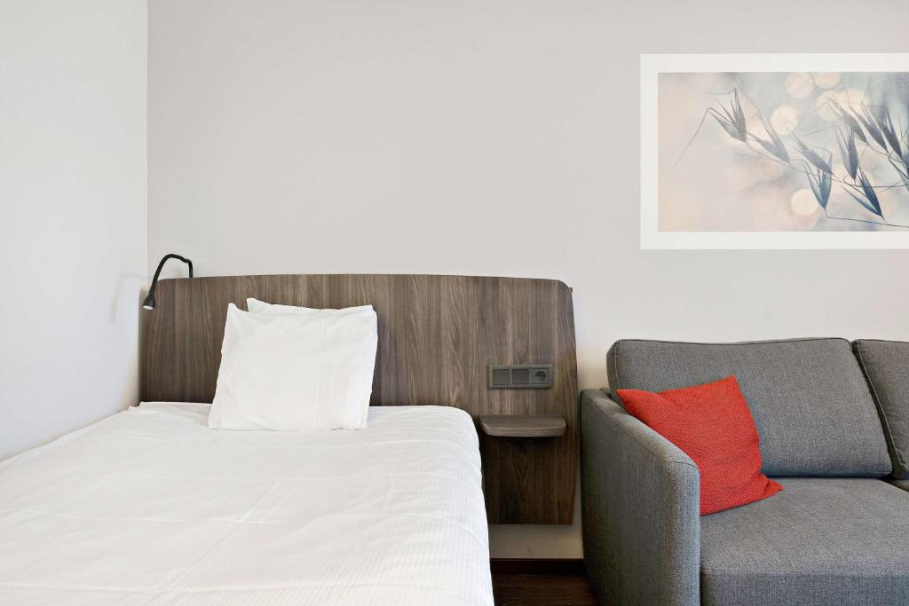 Postel nebo postele na pokoji v ubytování Best Western Karlshamn Spa & Relax