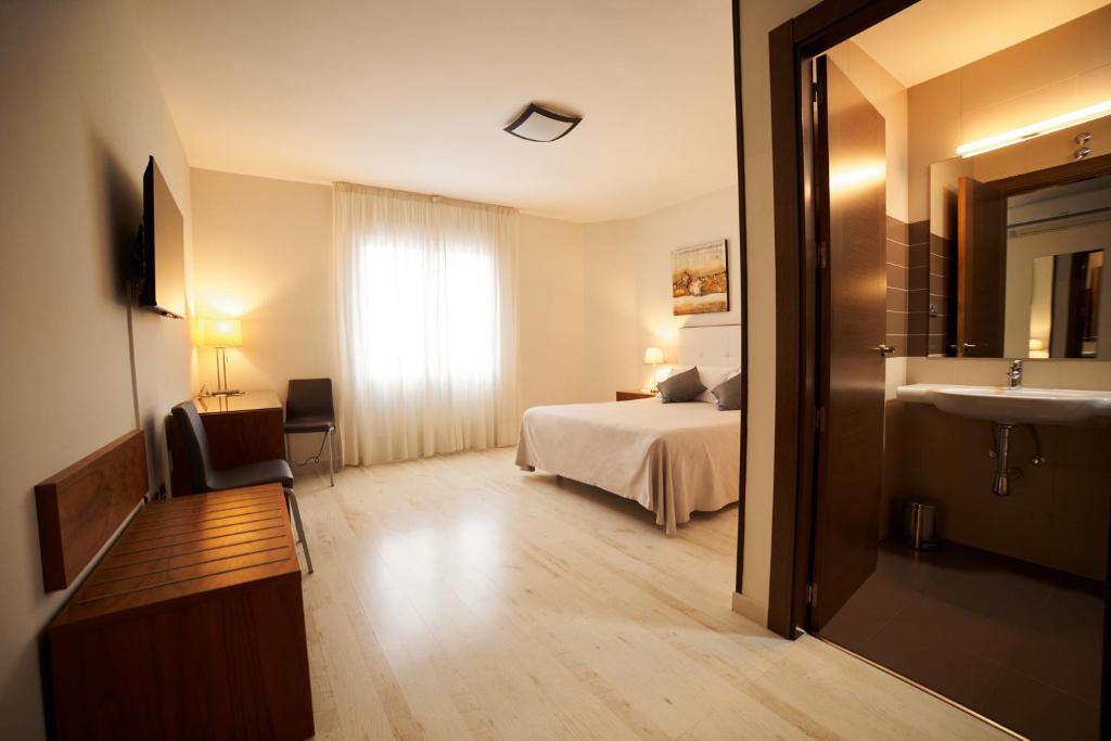Postel nebo postele na pokoji v ubytování El Hostal de Violeta