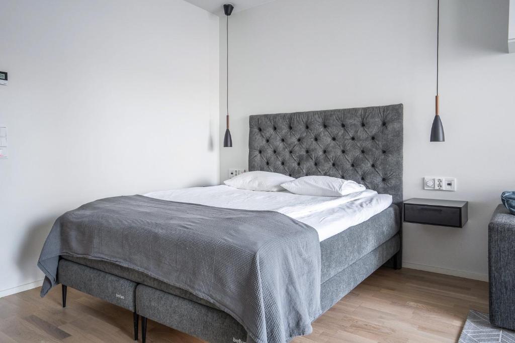 Postel nebo postele na pokoji v ubytování Turun Blanka A14