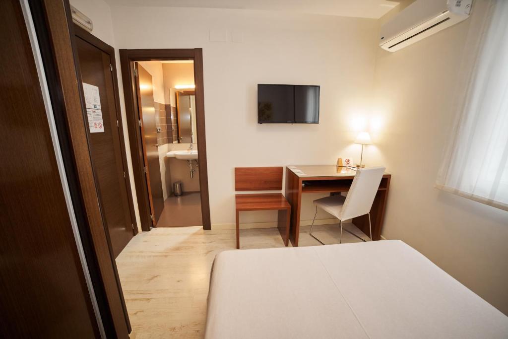TV a/nebo společenská místnost v ubytování El Hostal de Violeta