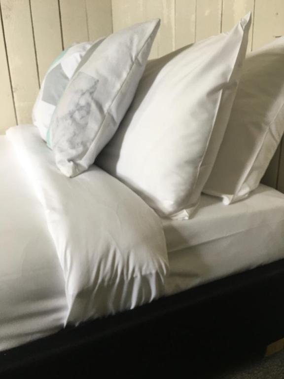 Llit o llits en una habitació de Snowman Lodge and Spa