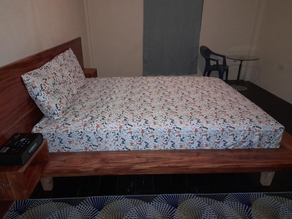 Postel nebo postele na pokoji v ubytování Tropical Suites
