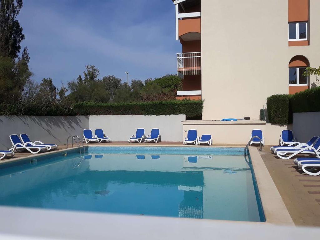 Bazén v ubytovaní Appartement 2 pièces avec piscine et parking, à 300m de la plage, animaux acceptés - Agde RICHELIEU - FR-1-702-32 alebo v jeho blízkosti