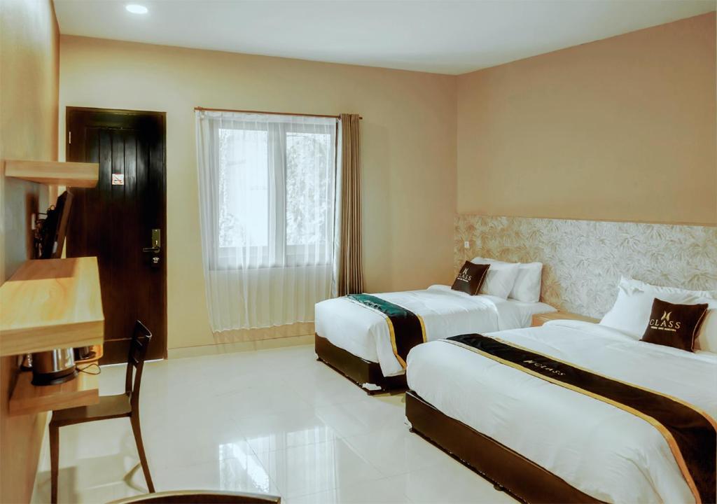 Letto o letti in una camera di Class Premium Guest House